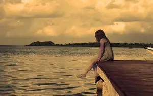 Alone On A Wooden Dock