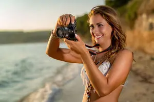 Beach Girl With Camera