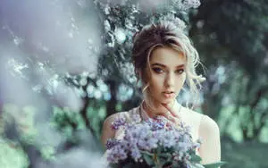 Beautiful Girls Surrounded With Flower