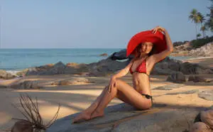 Bikini Girl Wearing A Red Hat