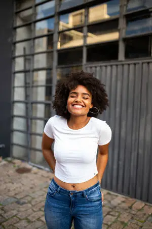  Caption: Empowered Elegance - A Black Woman in a Crisp White Shirt 