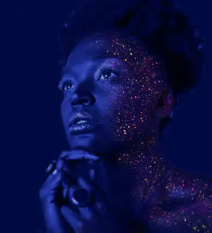 Black Woman With Glittery Makeup