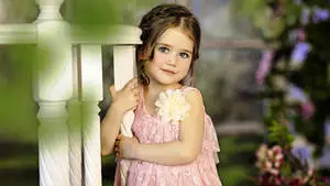 Cute Baby Girl In A Pink Dress