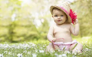 Cute Baby Girl in White Field