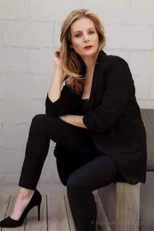 Elegant Portraitof Womanin Black Outfit