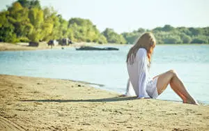Girl Alone At The Beach