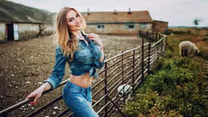 Girl In Jeans In Sheep Farm Pictures