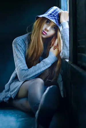 Girl Posing On Window