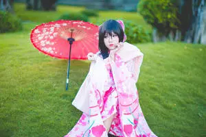 Elegance Embodied - Japanese Girl in Pink Kimono