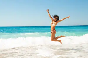 Jumping Beach Woman Bikini