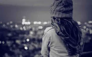 a girl looking out over the city