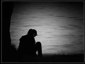 a person sitting on the ground