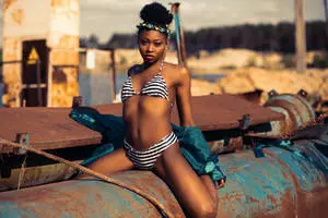 Odd Woman Bikini On Pipe