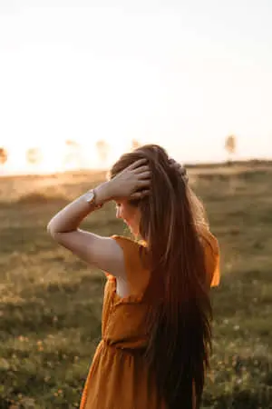Pretty Teen Girl In Sunset