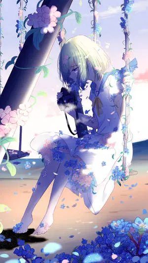 a girl sitting on a swing