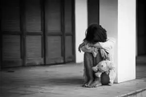 Sad Woman Sitting With A Teddy Bear Picture