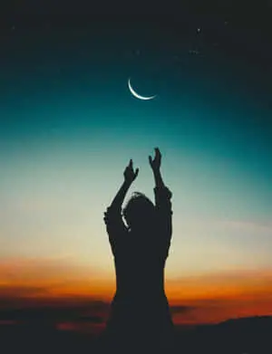 Single Woman Silhouette Reaching For The Moon