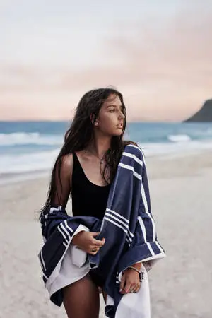 A Girl on the Beach Enjoying the Sun