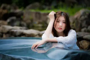 Thai Girl Wearing White Lace Top