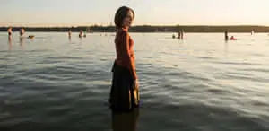 Unorthodox Girl Walking Alone In Beach